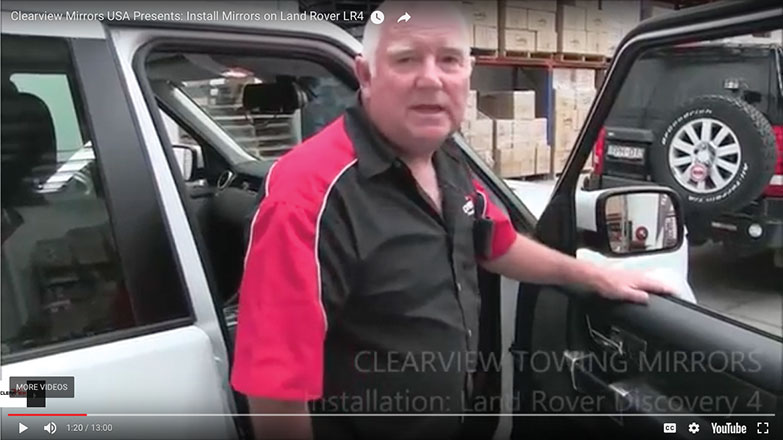 technician in Land Rover LR4 with door open