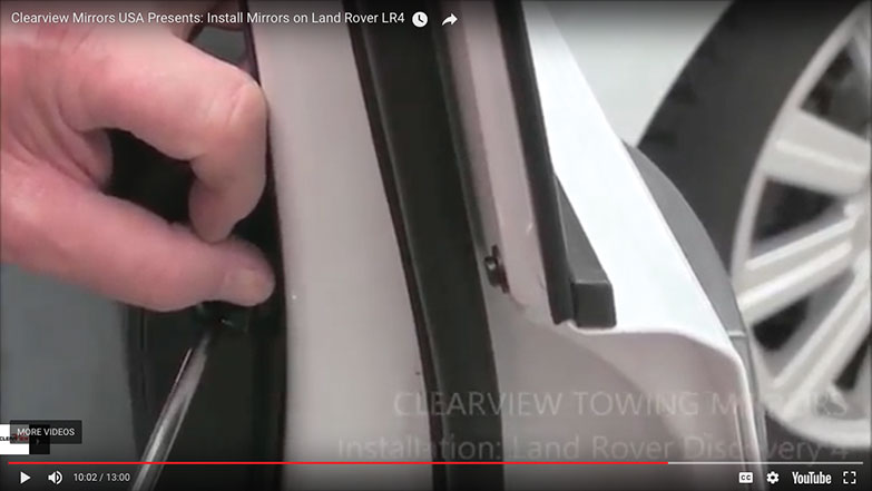 Re-install the screw at the right of the door panel