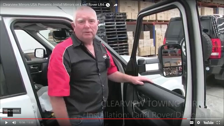 technician in Land Rover LR4 with door open